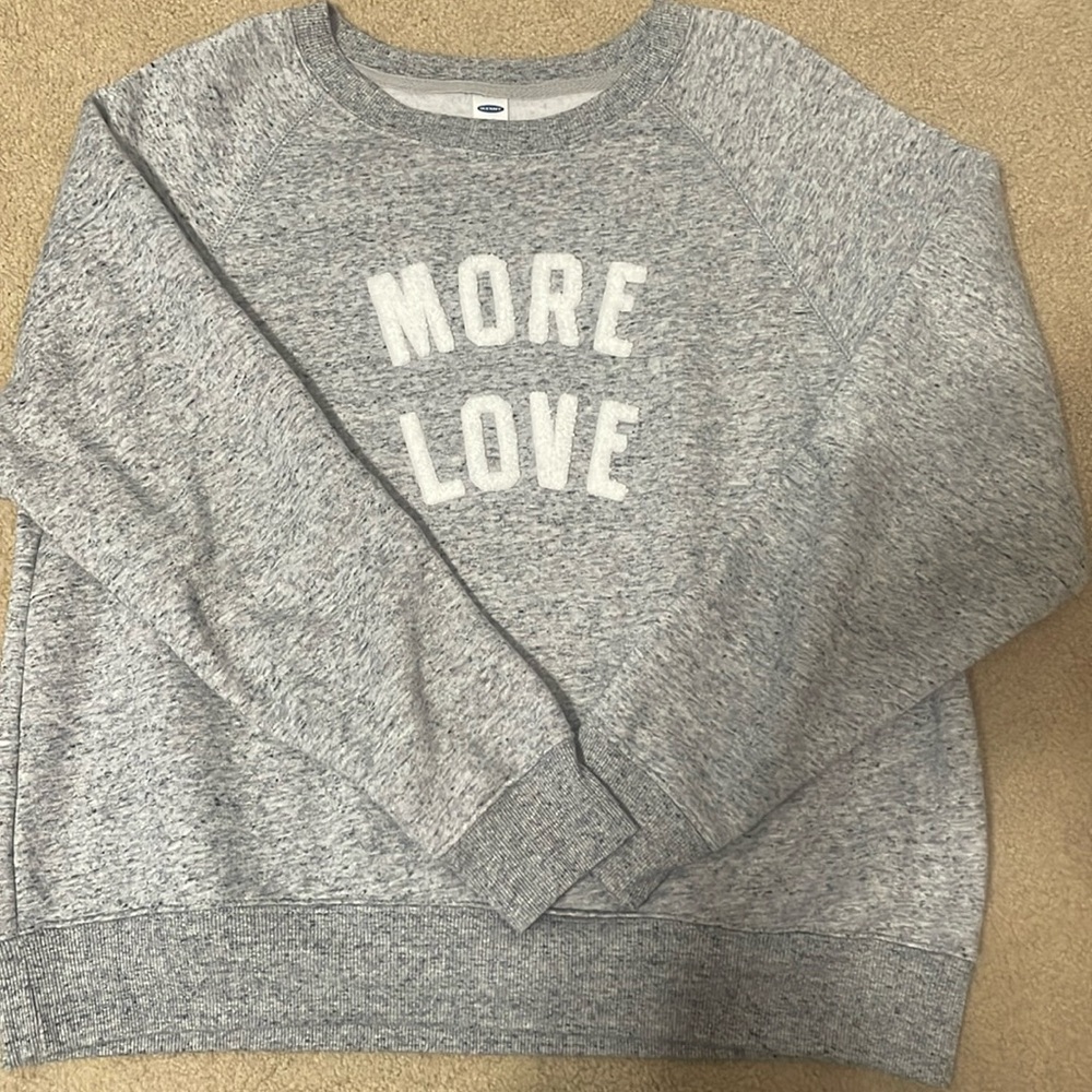 Speckled light gray cropped sweatshirt.
